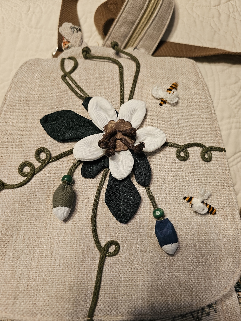 Backpack With Embroidered Applique Whimsical Floral Detail.